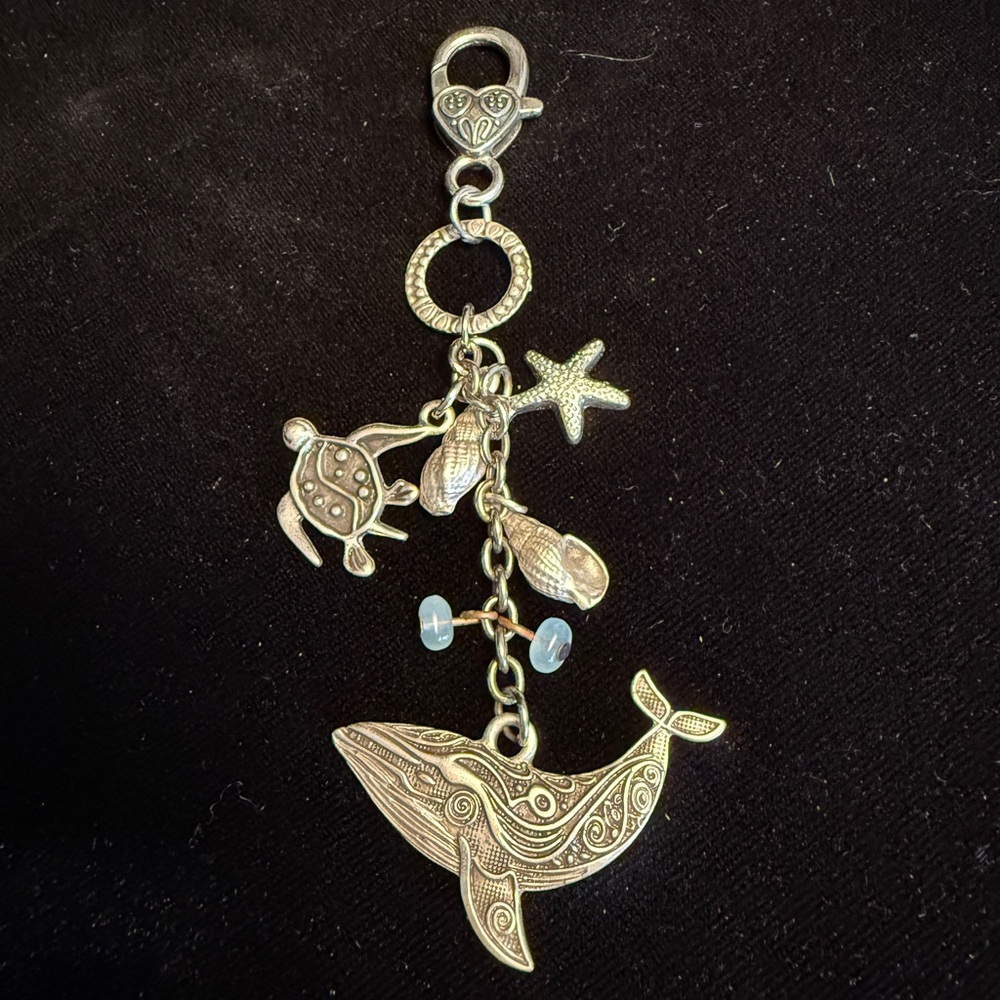 Silver Ocean-Themed bag charm hangs 4 1/2 inches